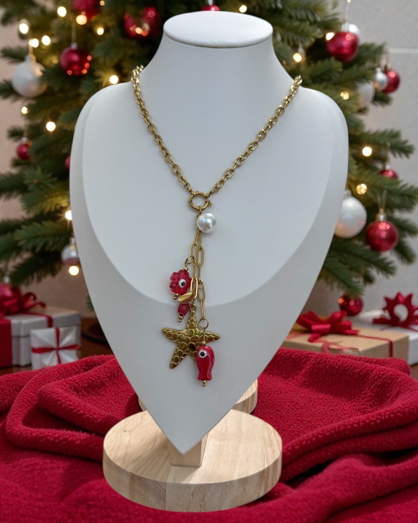 COLLAR OJO TURCO y ESTRELLA DE MAR EN DORADO