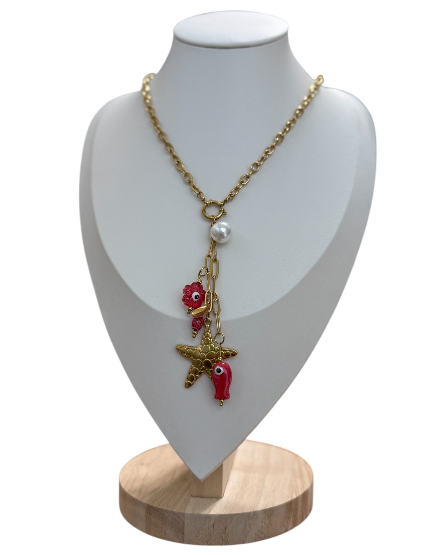 COLLAR OJO TURCO y ESTRELLA DE MAR EN DORADO